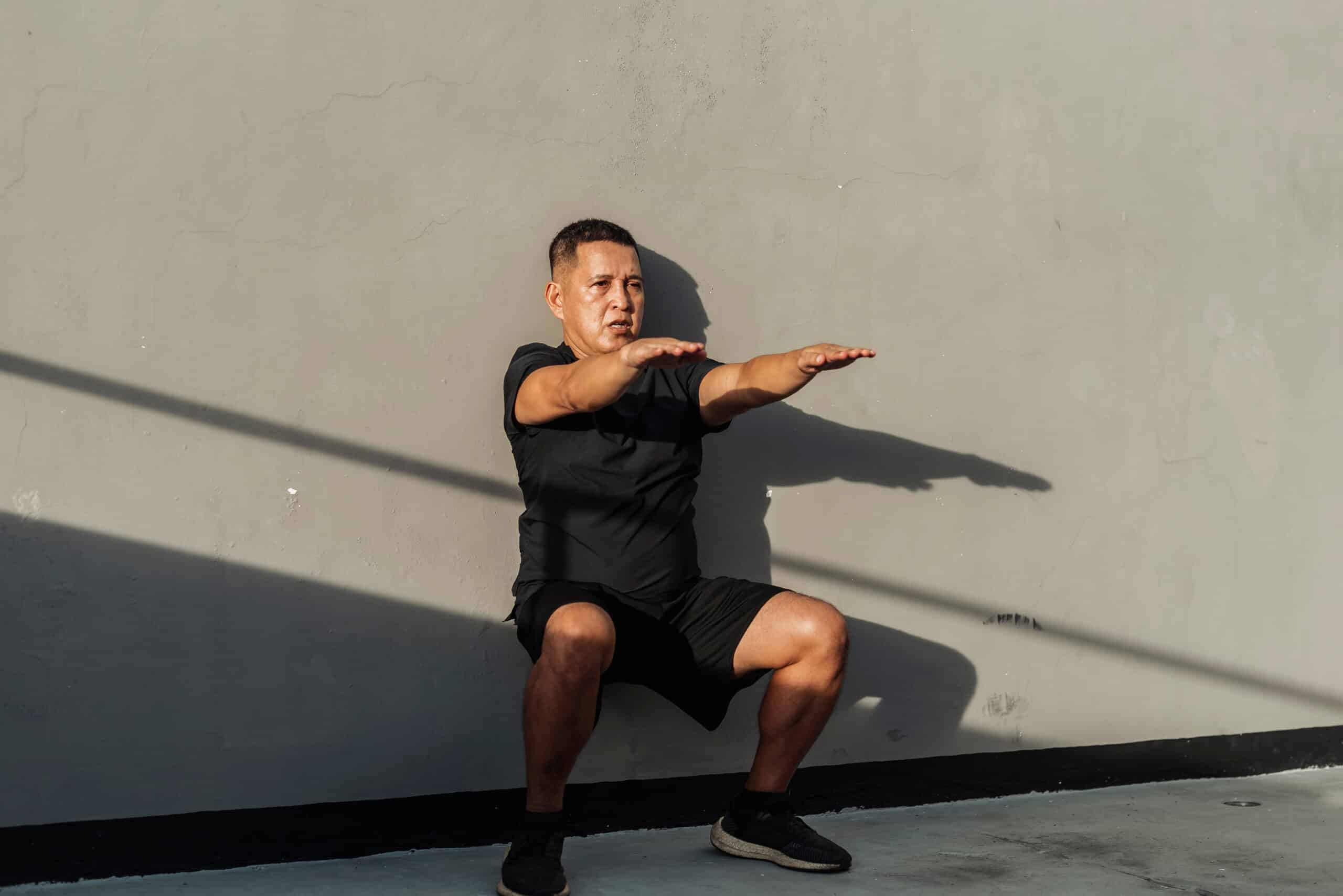 raggiungere una migliore forma fisica con il wall sit